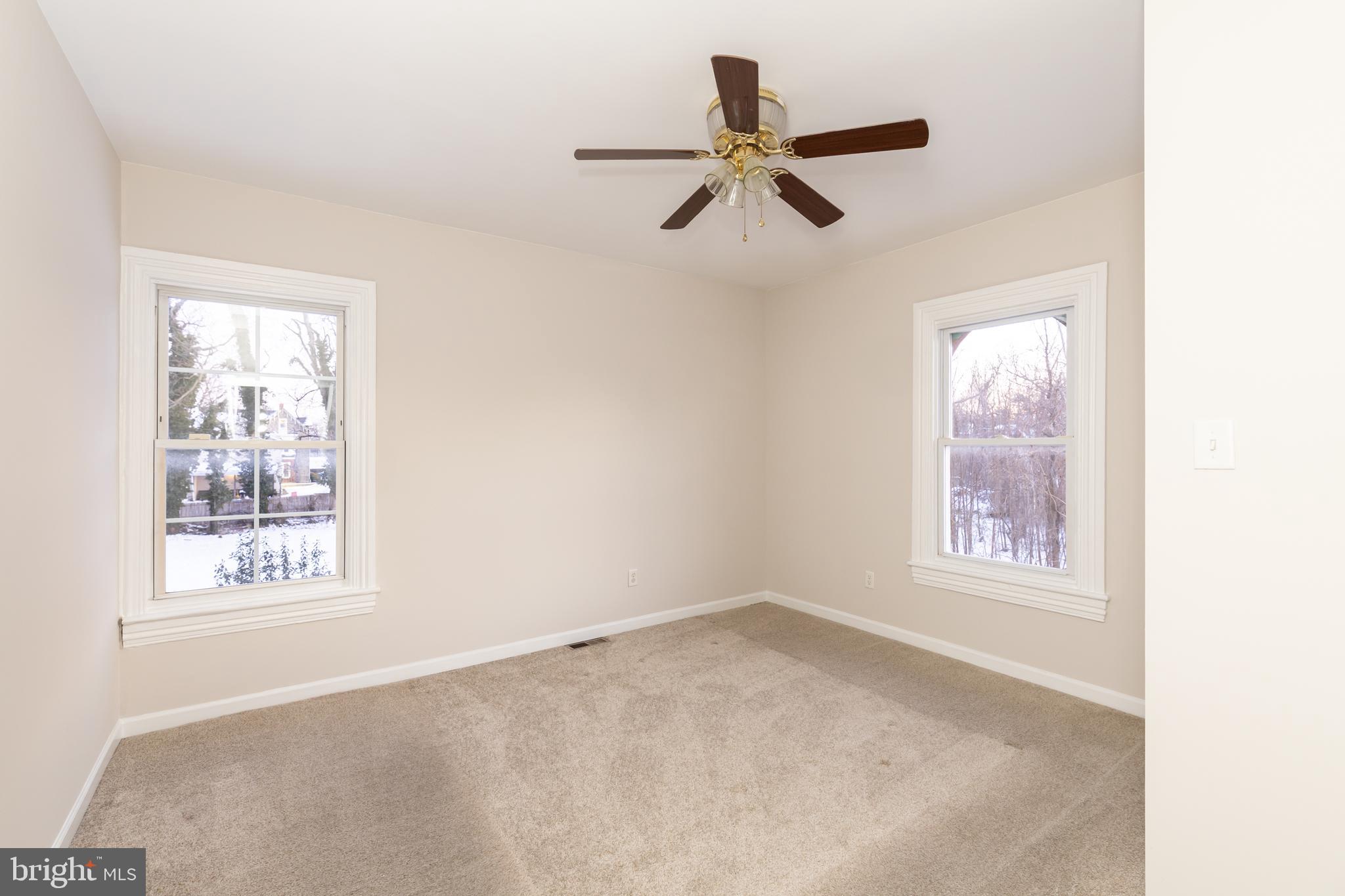 724 East Locust Avenue Philadelphia, PA 19144 - Photo 23 of 34 a view of a big room with windows and cabinet