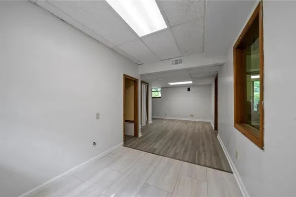 a view of a livingroom with wooden floor