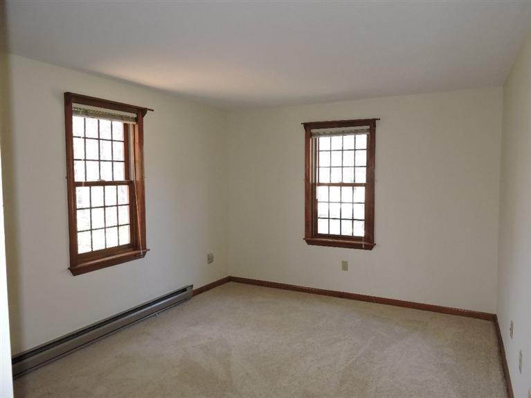 130 Surf Drive Mashpee, MA 02649 - Photo 15 of 29 an empty room with windows