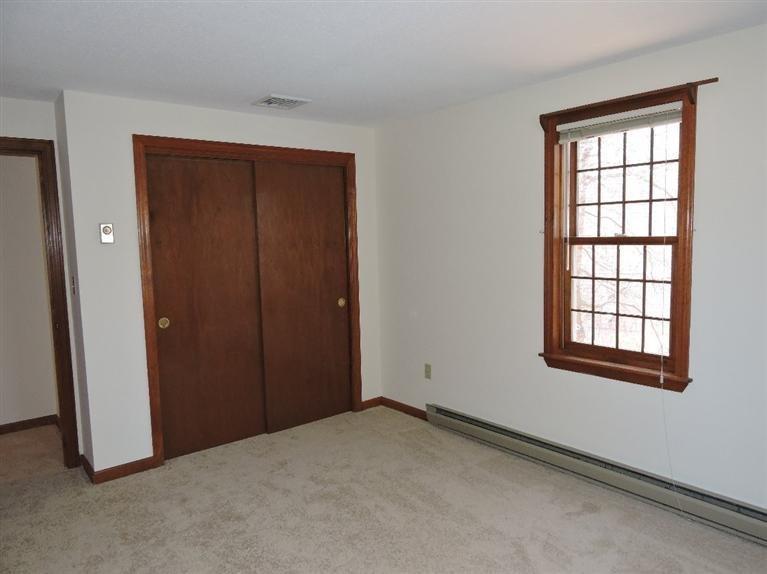 130 Surf Drive Mashpee, MA 02649 - Photo 16 of 29 an empty room with windows