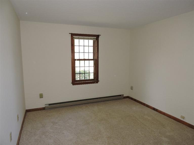 130 Surf Drive Mashpee, MA 02649 - Photo 18 of 29 an empty room with a window