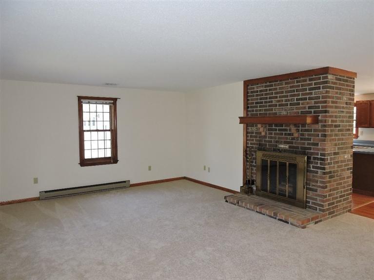 130 Surf Drive Mashpee, MA 02649 - Photo 5 of 29 an empty room with windows