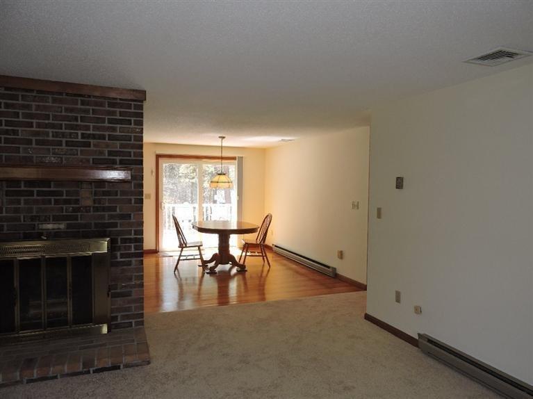 130 Surf Drive Mashpee, MA 02649 - Photo 7 of 29 a view of a livingroom with furniture and window