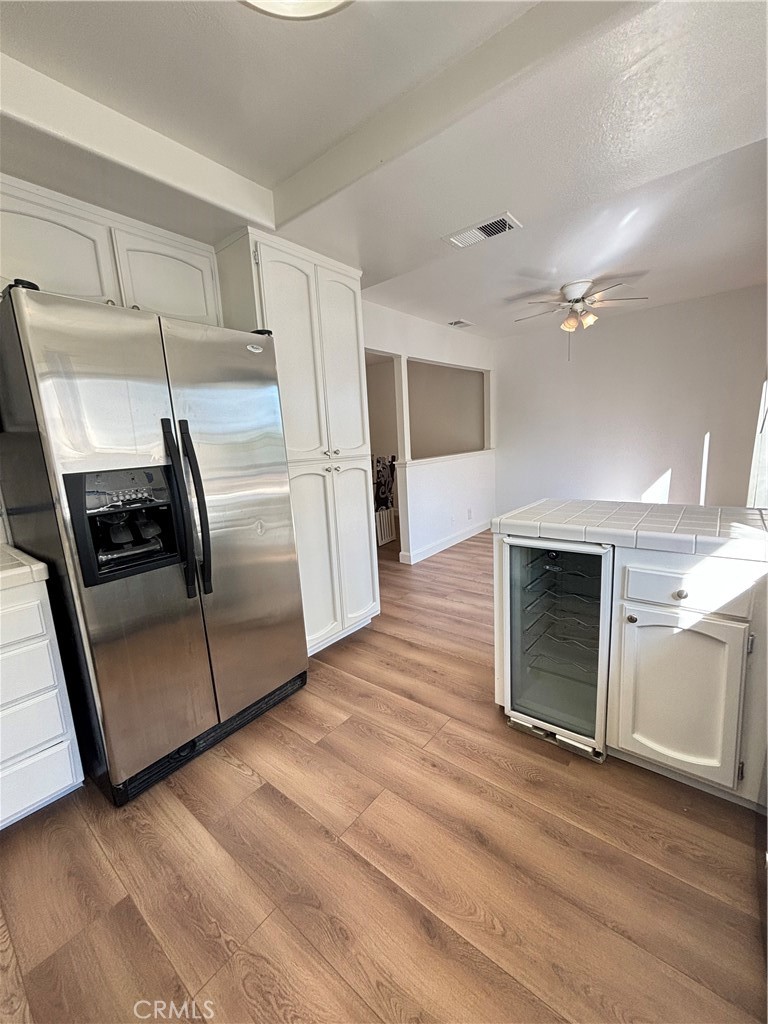 7100 Balboa Boulevard, Unit 902 Van Nuys, CA 91406 - Photo 13 of 29 a kitchen with granite countertop a refrigerator and a sink
