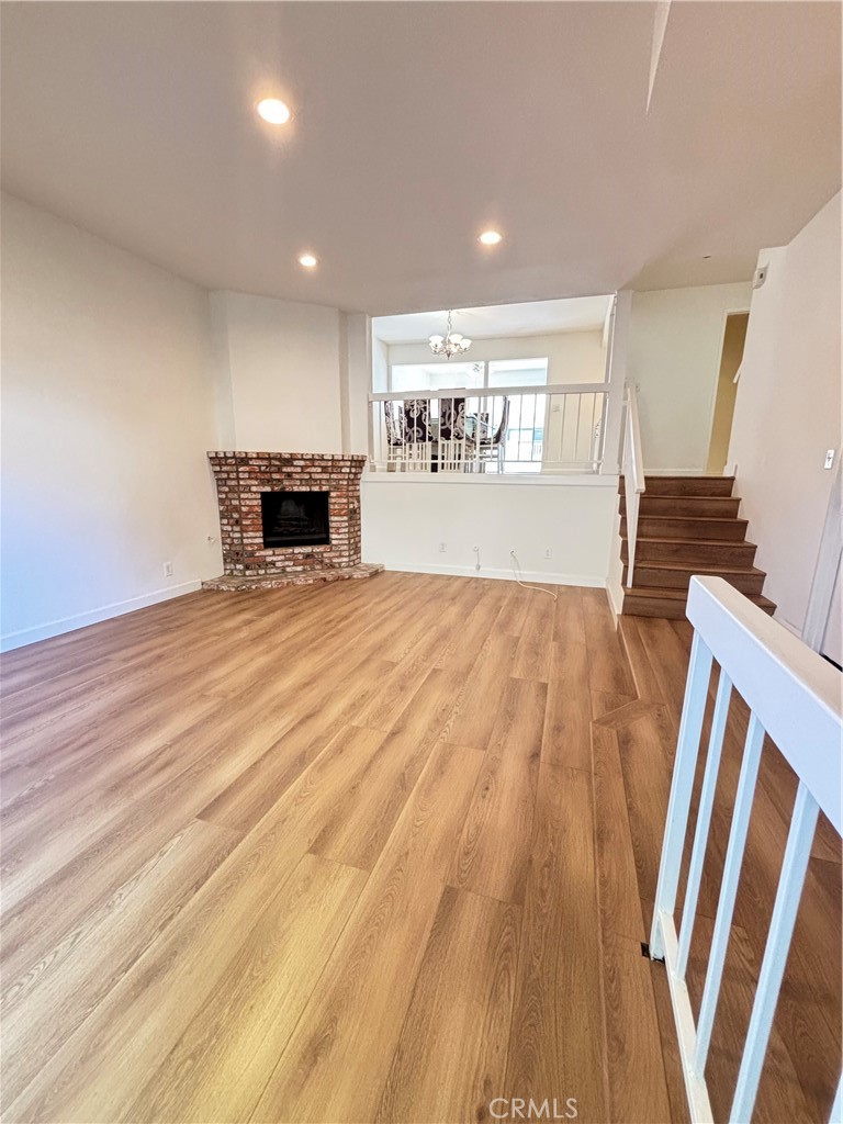 7100 Balboa Boulevard, Unit 902 Van Nuys, CA 91406 - Photo 2 of 29 a view of livingroom with furniture and fireplace