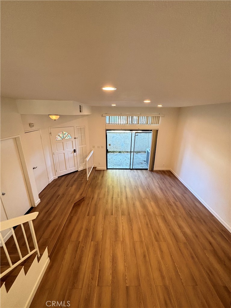 7100 Balboa Boulevard, Unit 902 Van Nuys, CA 91406 - Photo 5 of 29 a view of a room with wooden floor