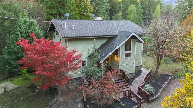 a view of house with outdoor space and seating space