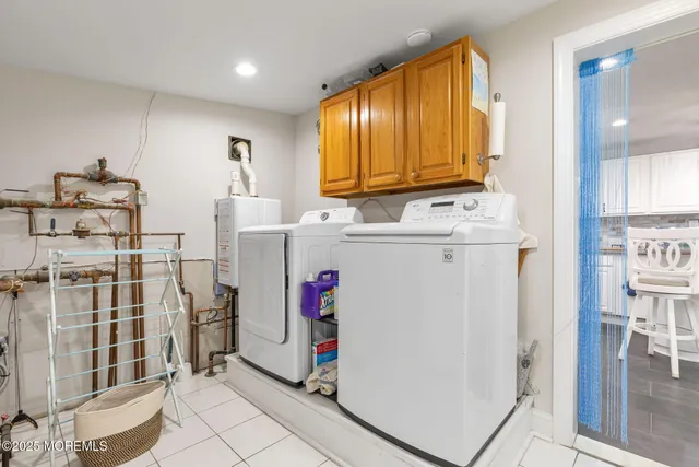 a view of a kitchen with utility and utility