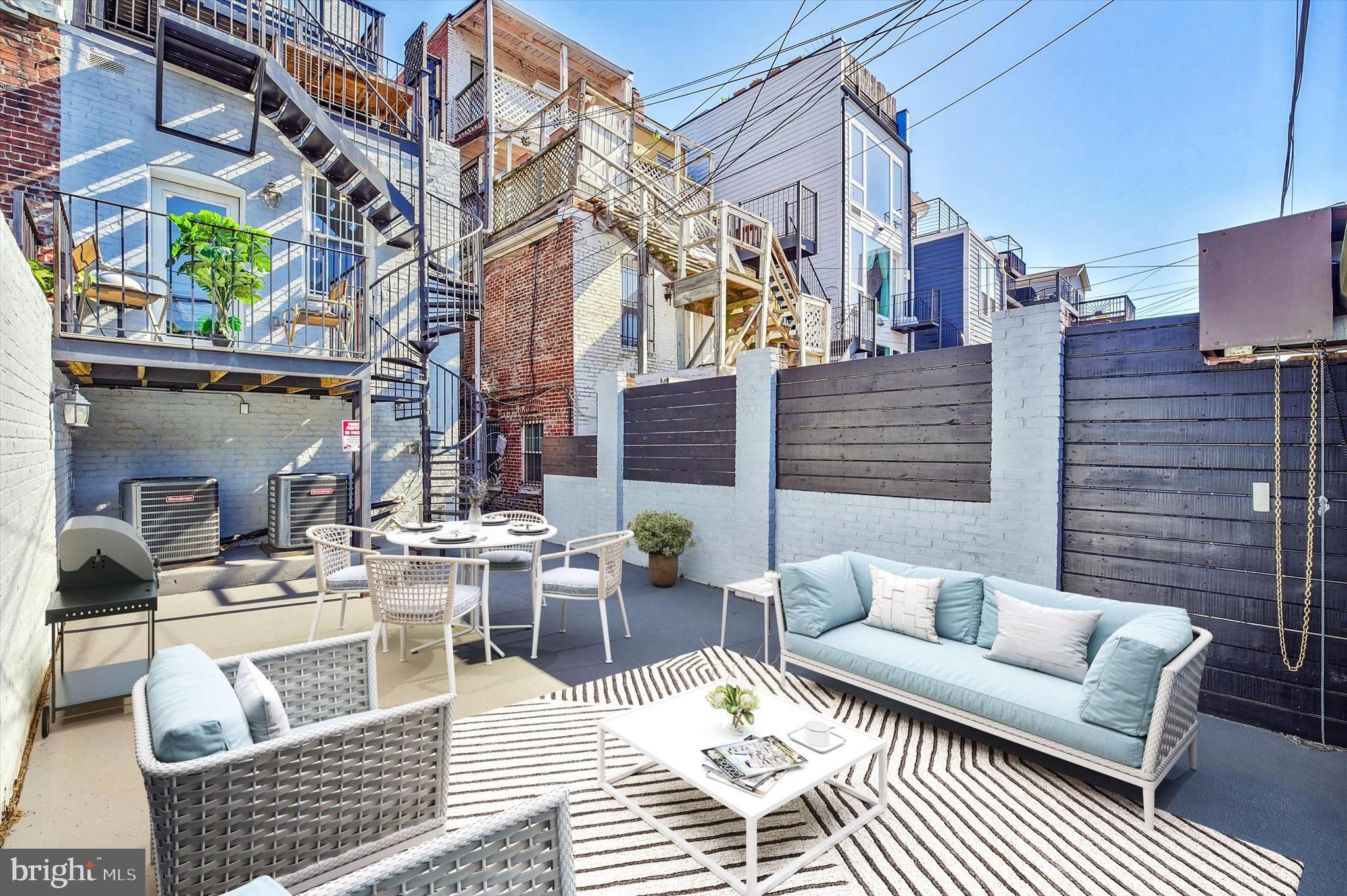 1240 Columbia Road Northwest, Unit 1 Washington, DC 20009 - Photo 15 of 25 a building outdoor space with patio furniture