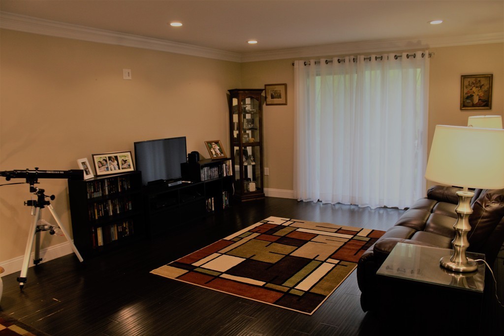 10 Shadowbrook Lane, Unit 19 Milford, MA 01757 - Photo 5 of 22 a room with furniture