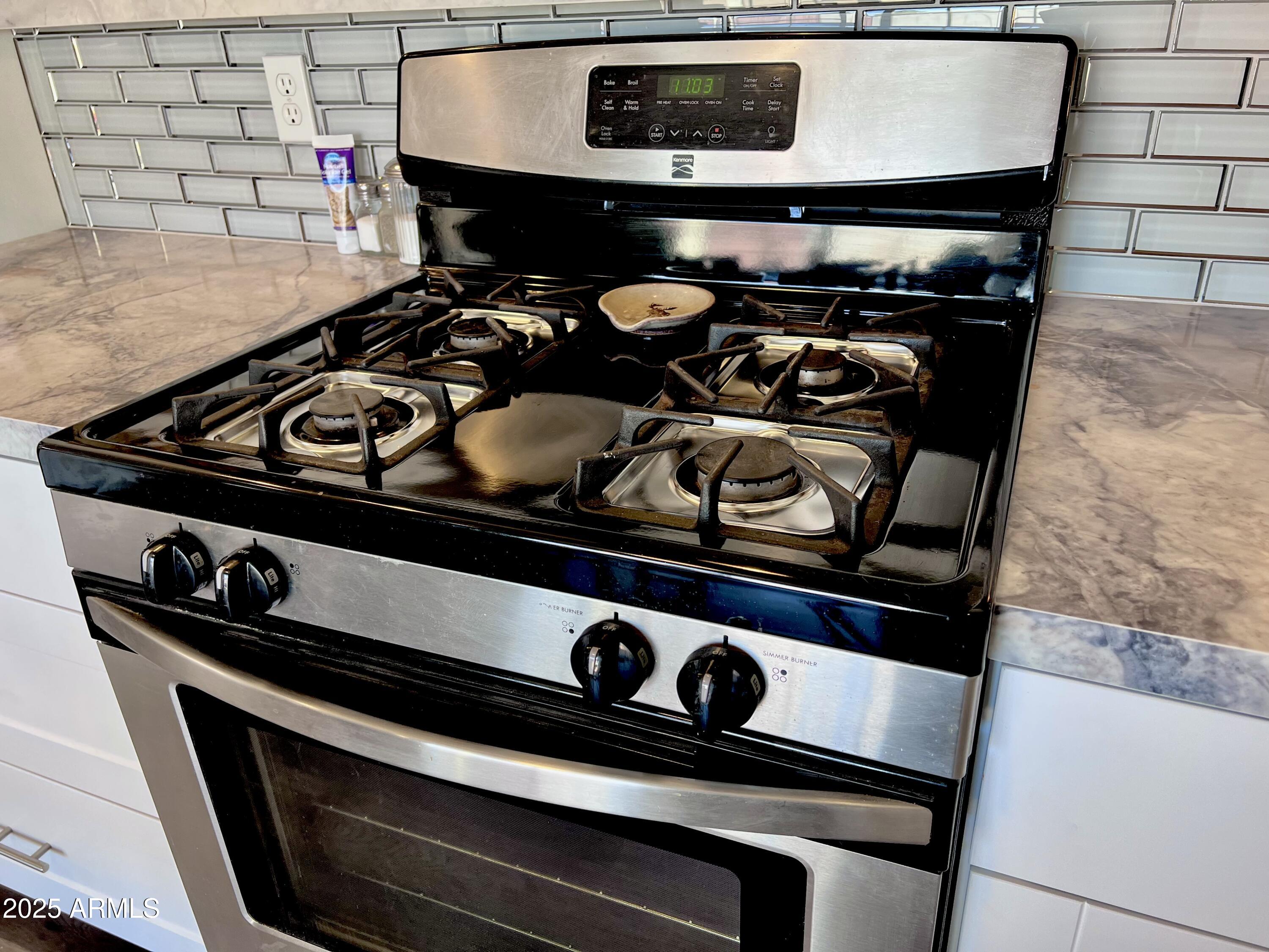3328 West Charter Oak Road Phoenix, AZ 85029 - Photo 12 of 39 a close view of stove top oven