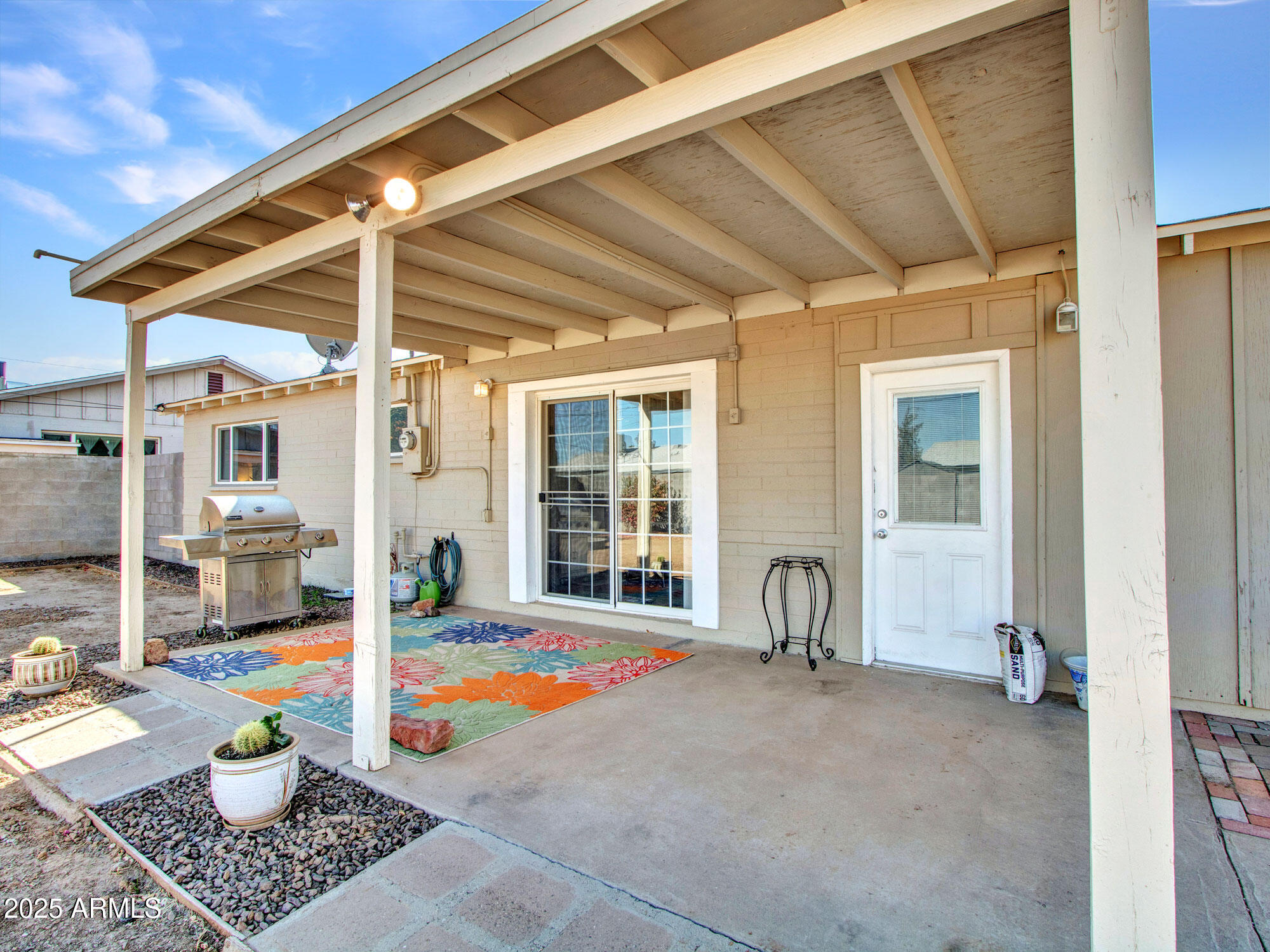 3328 West Charter Oak Road Phoenix, AZ 85029 - Photo 21 of 39 a front view of a house with patio