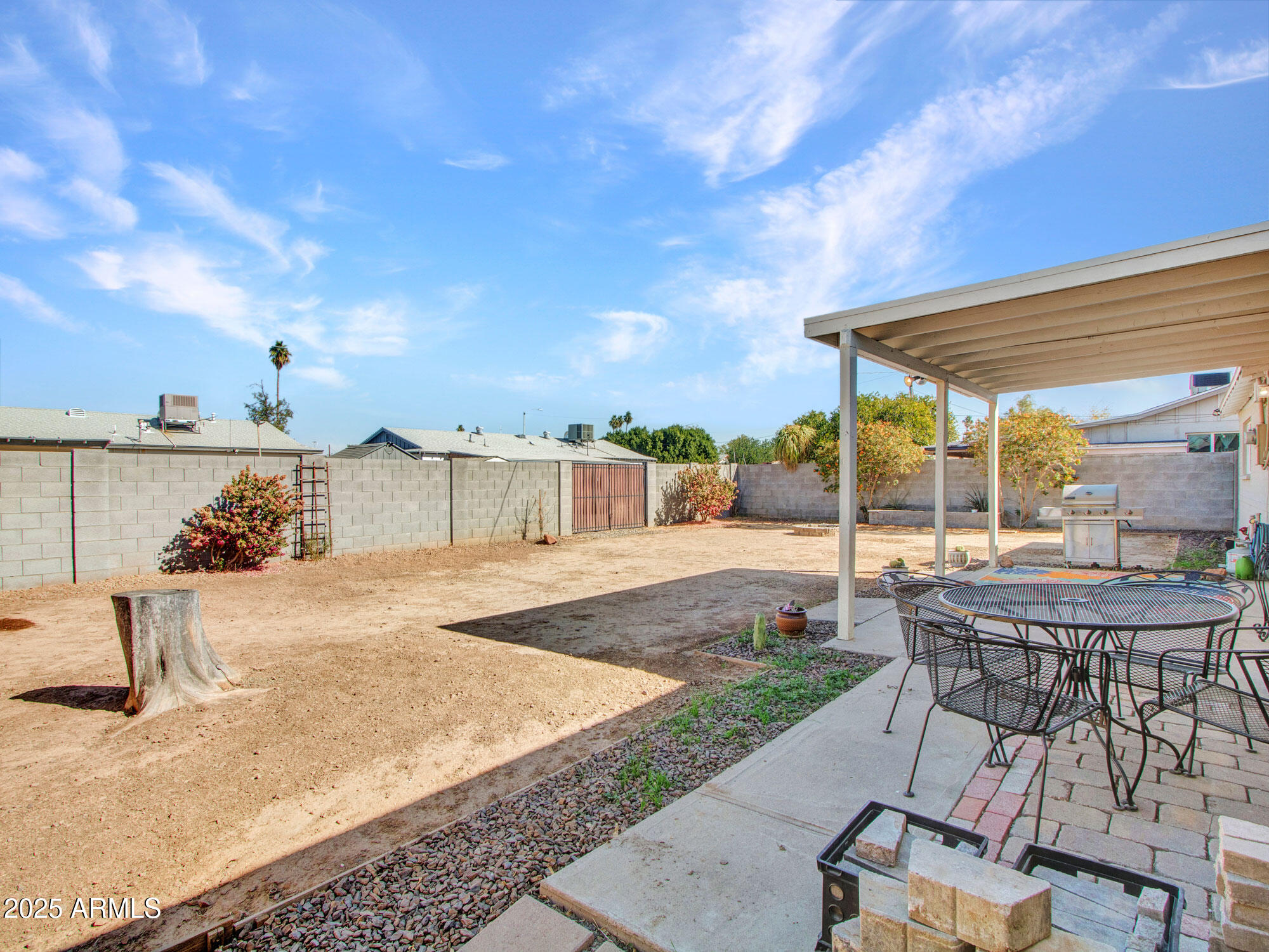 3328 West Charter Oak Road Phoenix, AZ 85029 - Photo 23 of 39 a view of a backyard with sitting area