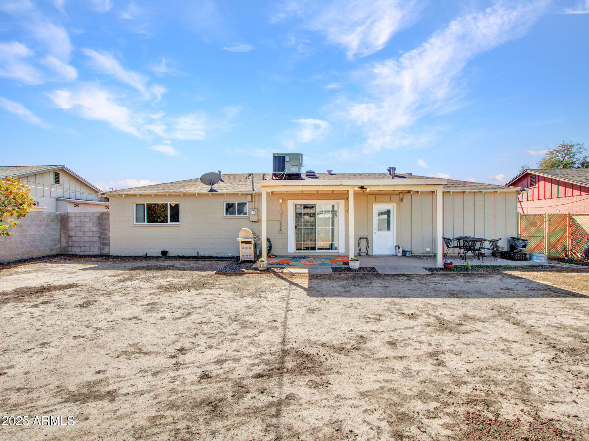 3328 West Charter Oak Road Phoenix, AZ 85029 - Photo 25 of 39 a front view of a house with a yard