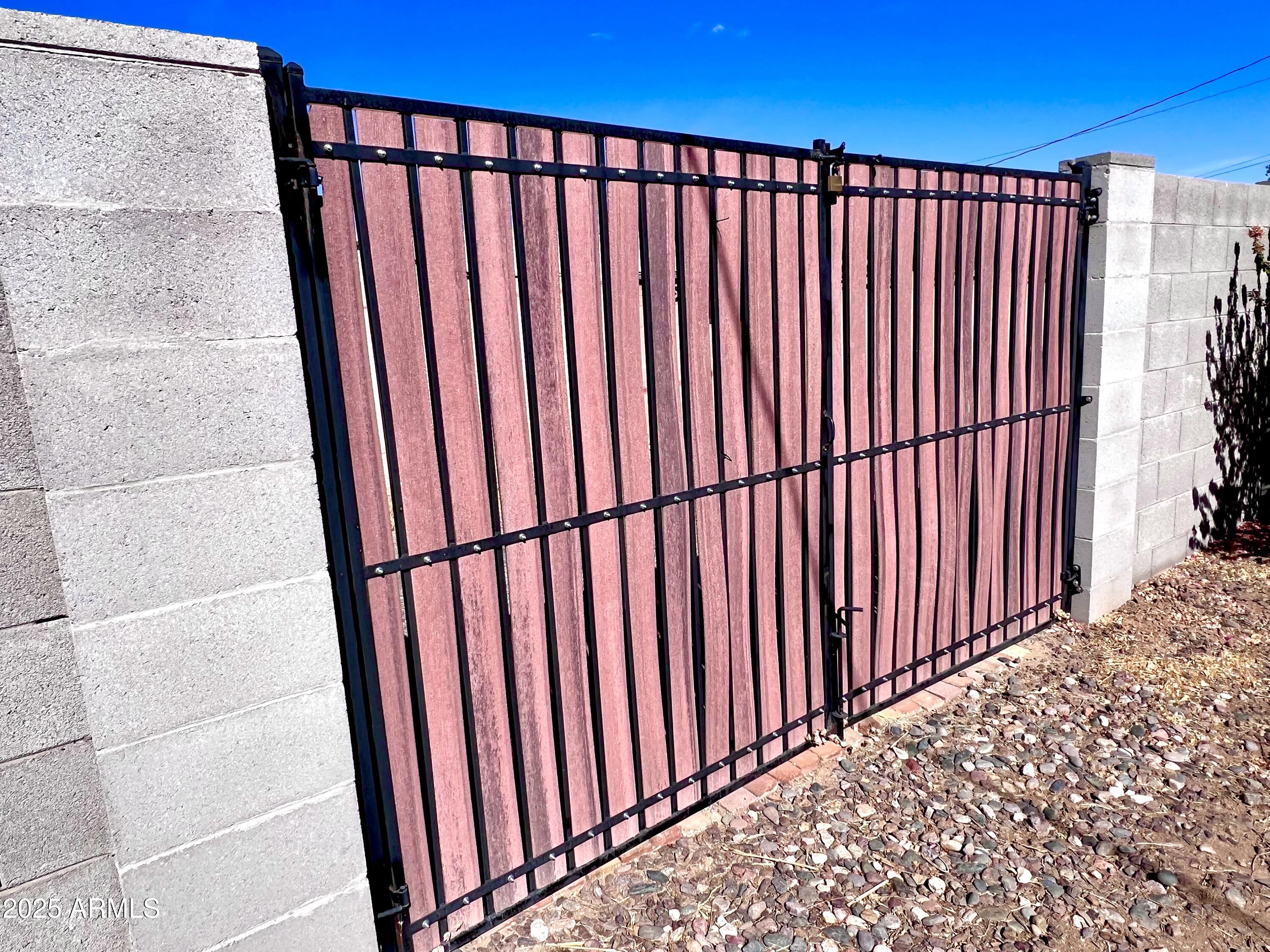 3328 West Charter Oak Road Phoenix, AZ 85029 - Photo 27 of 39 a view of a black gate
