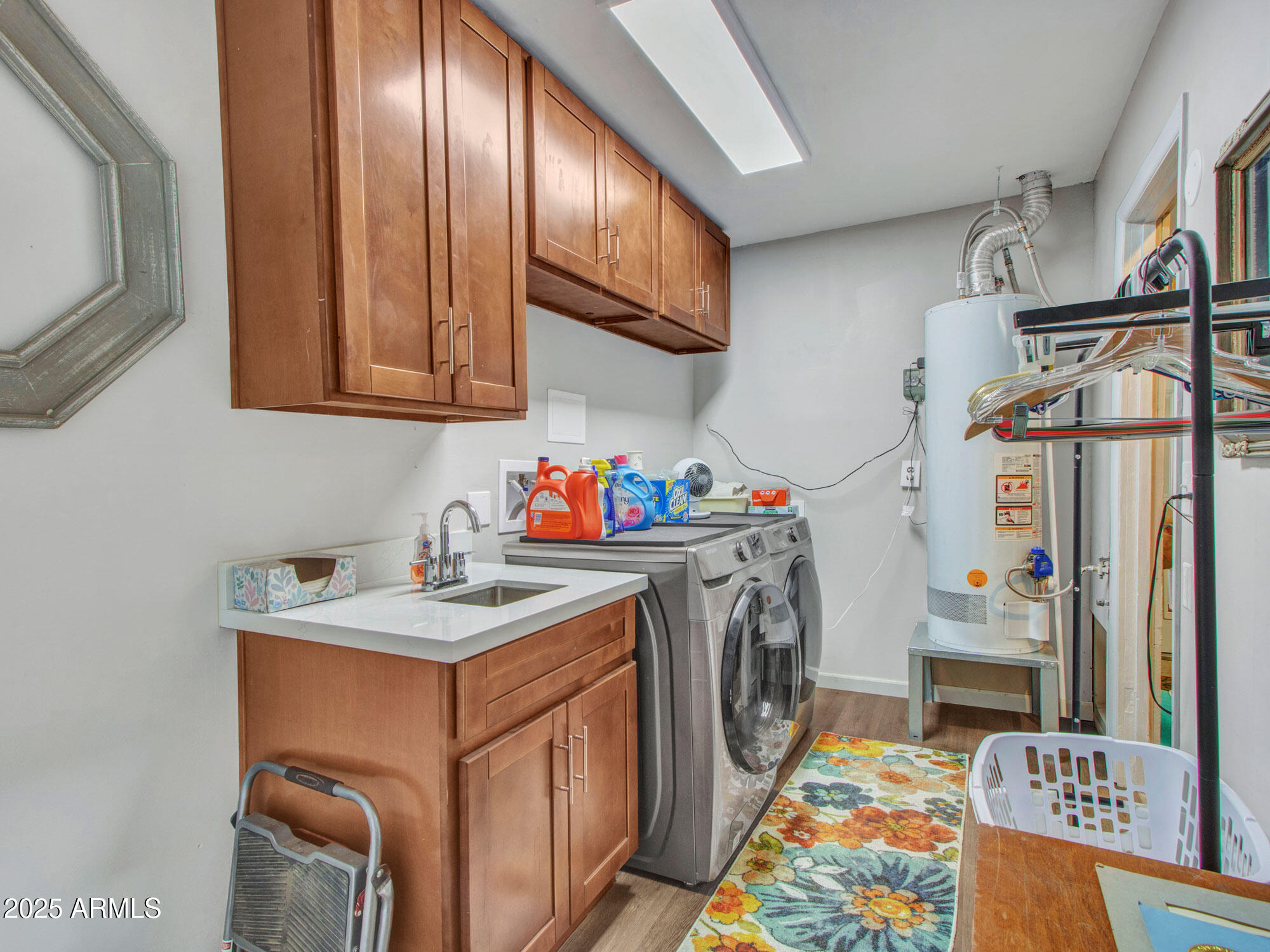 3328 West Charter Oak Road Phoenix, AZ 85029 - Photo 37 of 39 a utility room with fridge dryer and washer