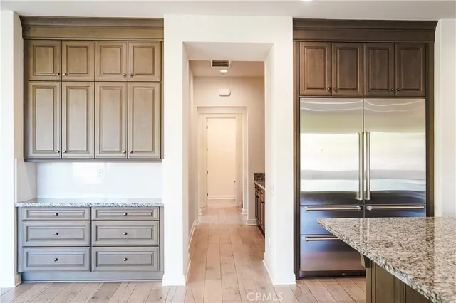 a view of a dresser with wooden floor
