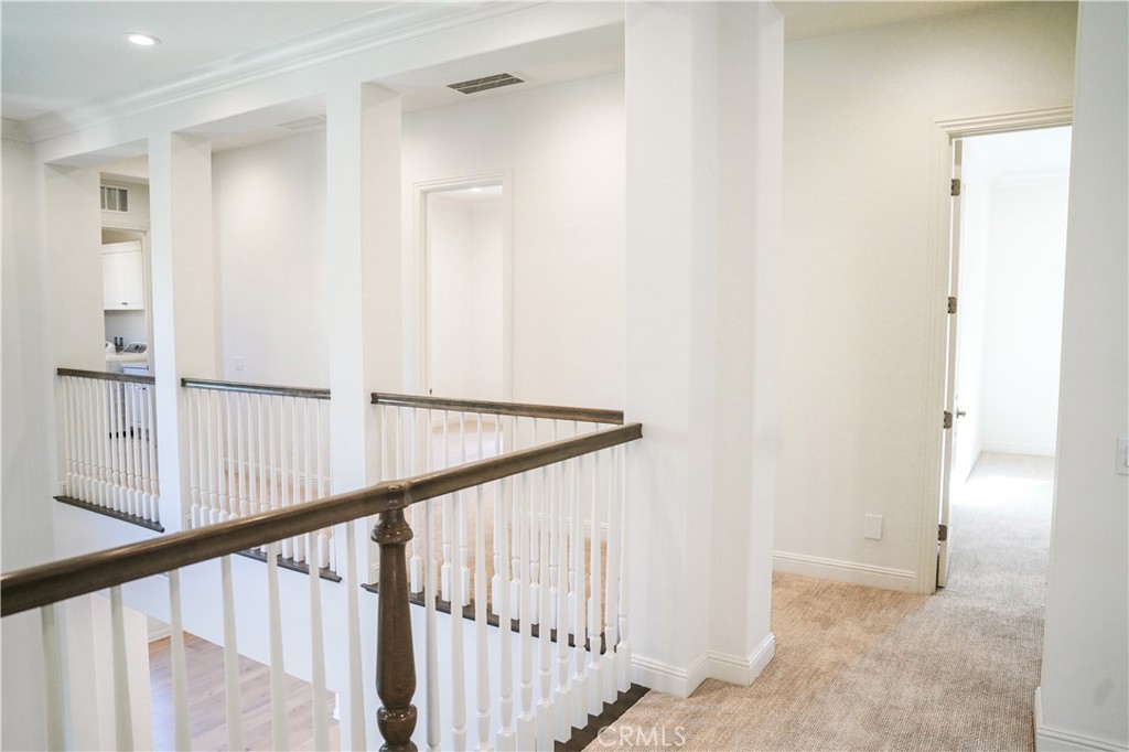 111 Lanzon Irvine, CA 92602 - Photo 16 of 42 a view of a hallway with the door