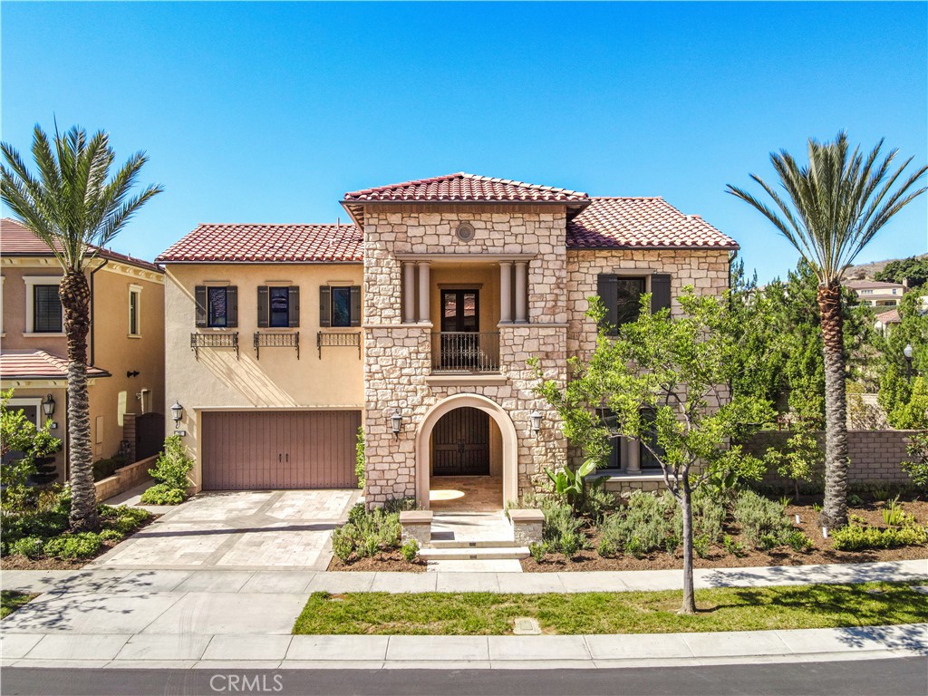 111 Lanzon Irvine, CA 92602 - Photo 2 of 42 a front view of a house with garden