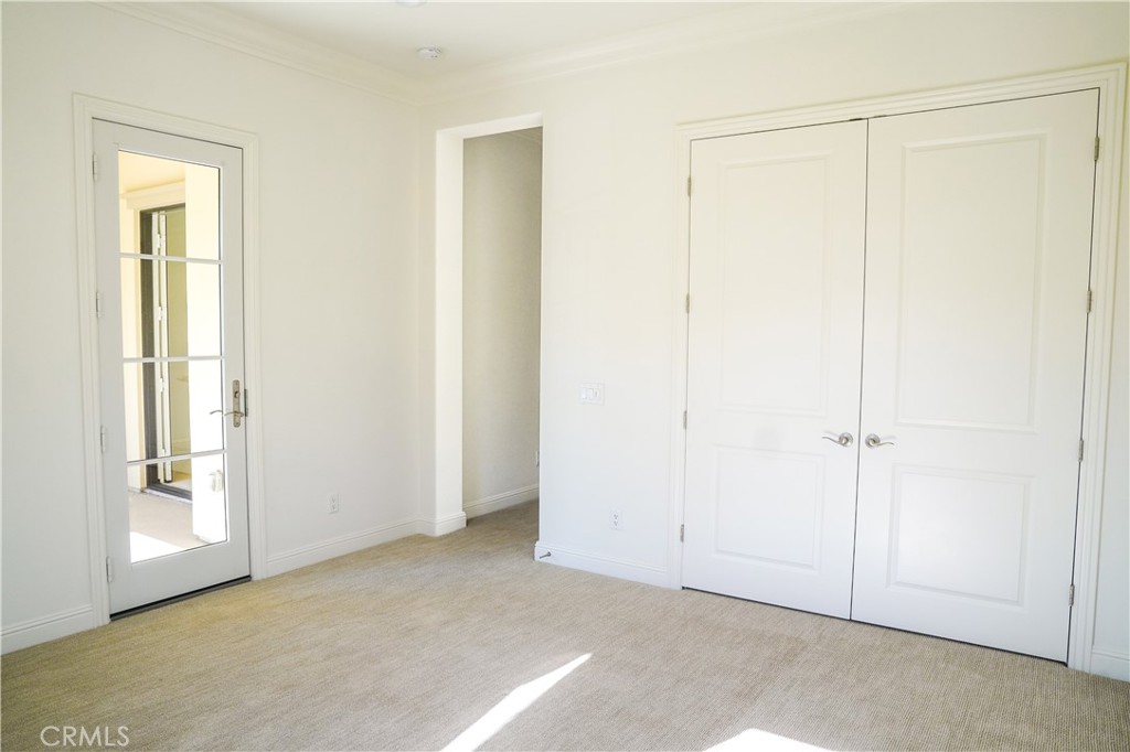 111 Lanzon Irvine, CA 92602 - Photo 21 of 42 an empty room with a door