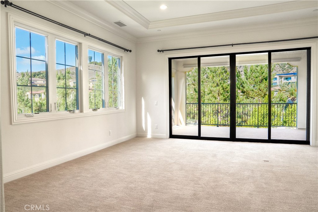 111 Lanzon Irvine, CA 92602 - Photo 23 of 42 a view of an empty room with a large window