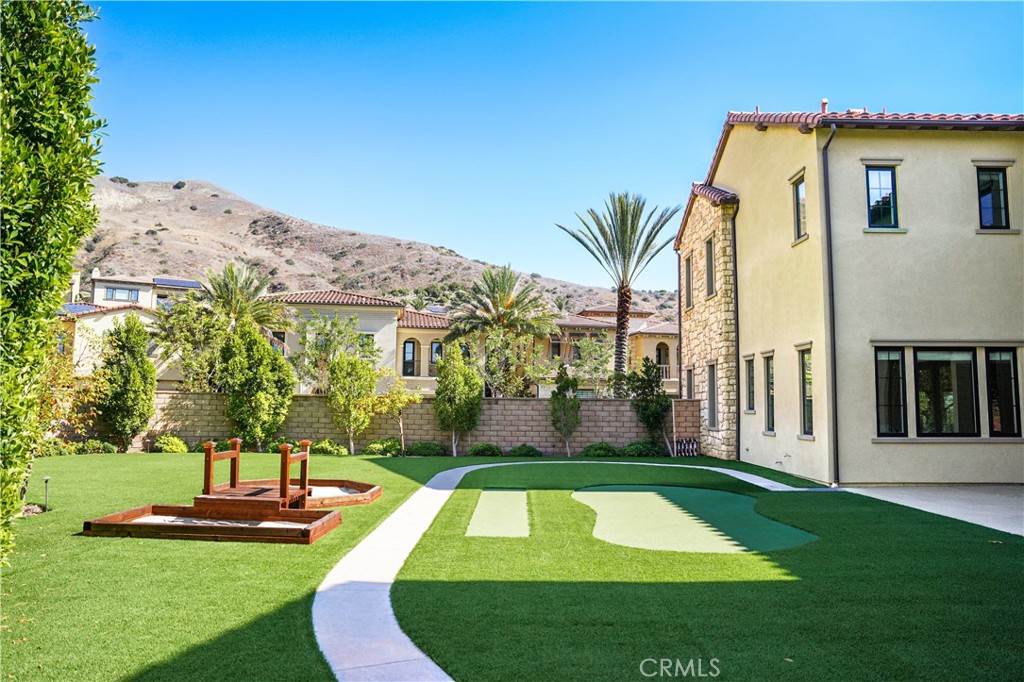 111 Lanzon Irvine, CA 92602 - Photo 30 of 42 a view of backyard with swimming pool and seating space