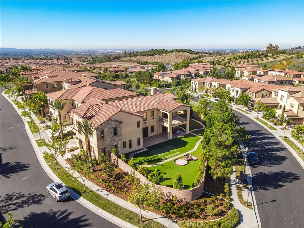 111 Lanzon Irvine, CA 92602 - Photo 37 of 42 an aerial view of residential houses with outdoor space and swimming pool