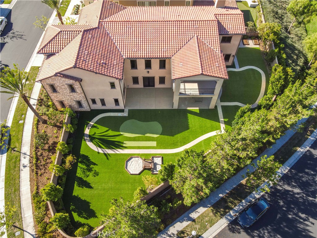 111 Lanzon Irvine, CA 92602 - Photo 38 of 42 a front view of a house with a garden