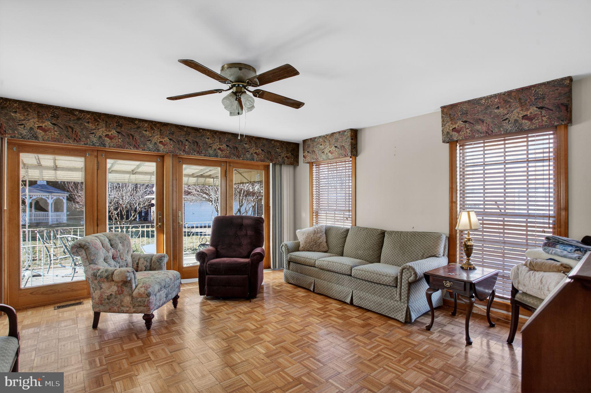 4508 Benson Street Philadelphia, PA 19136 - Photo 13 of 26 a living room with furniture and a large window