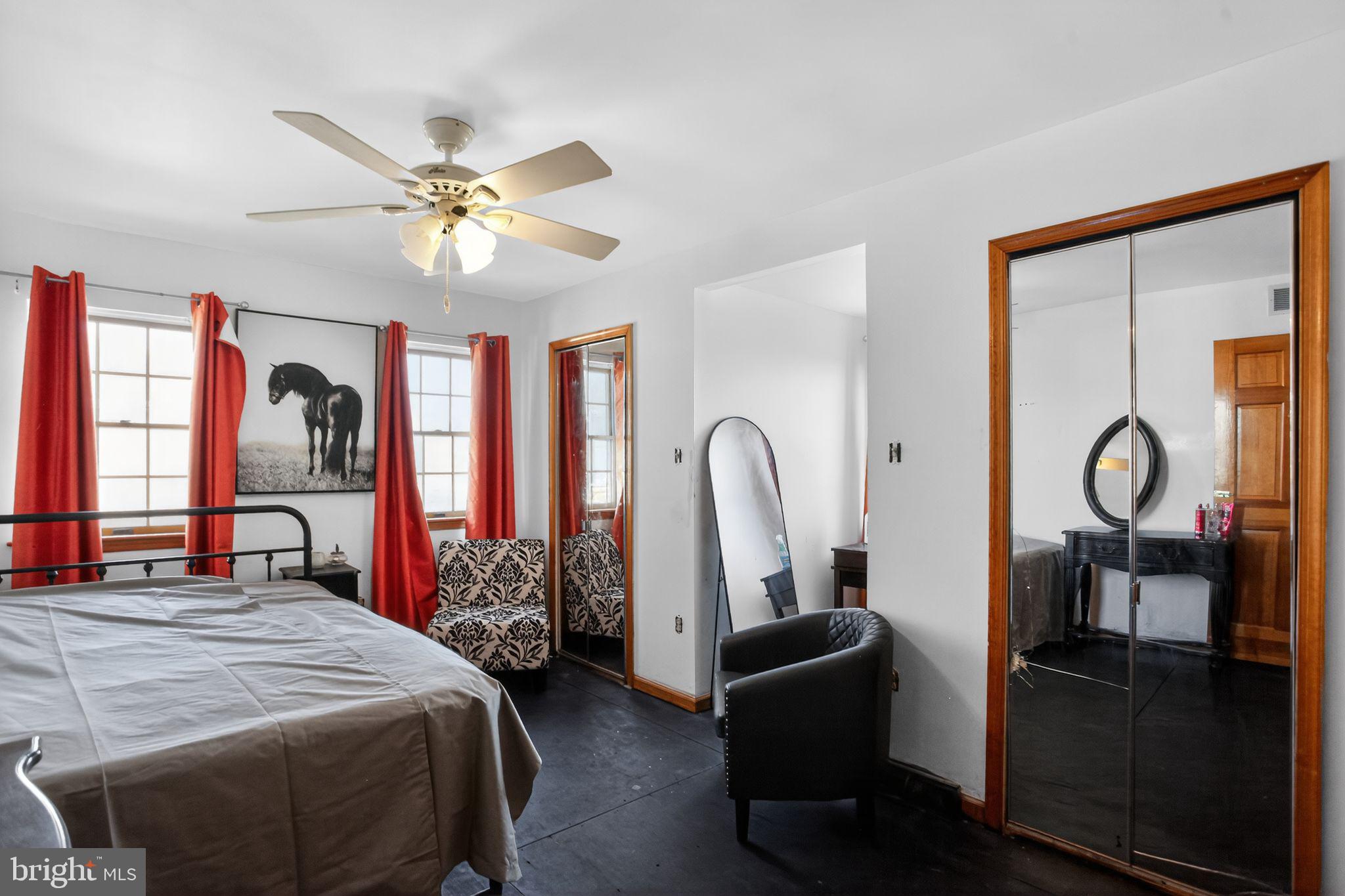 4508 Benson Street Philadelphia, PA 19136 - Photo 18 of 26 a bedroom with bed and a large window