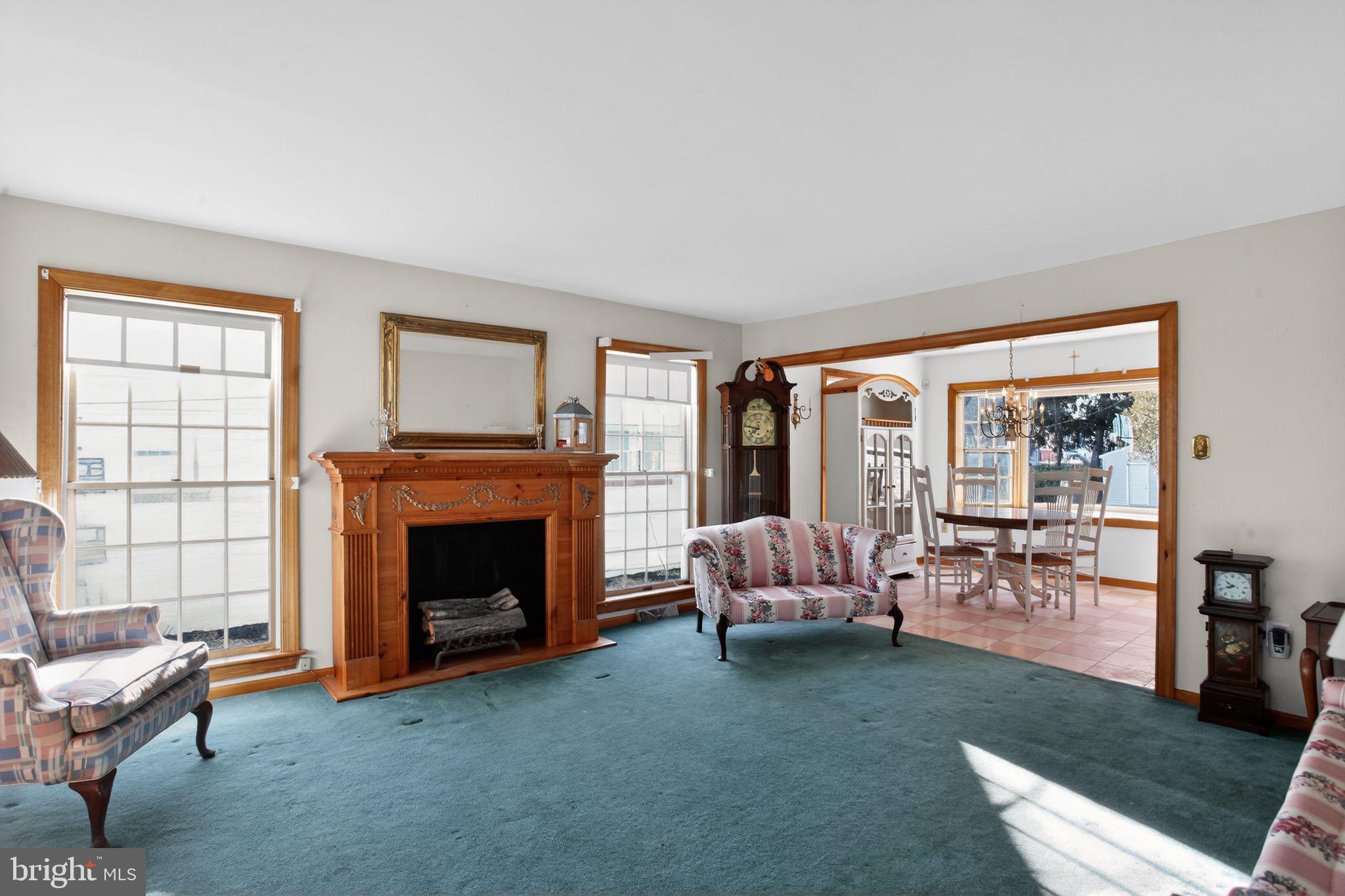 4508 Benson Street Philadelphia, PA 19136 - Photo 5 of 26 a living room with furniture and a fireplace