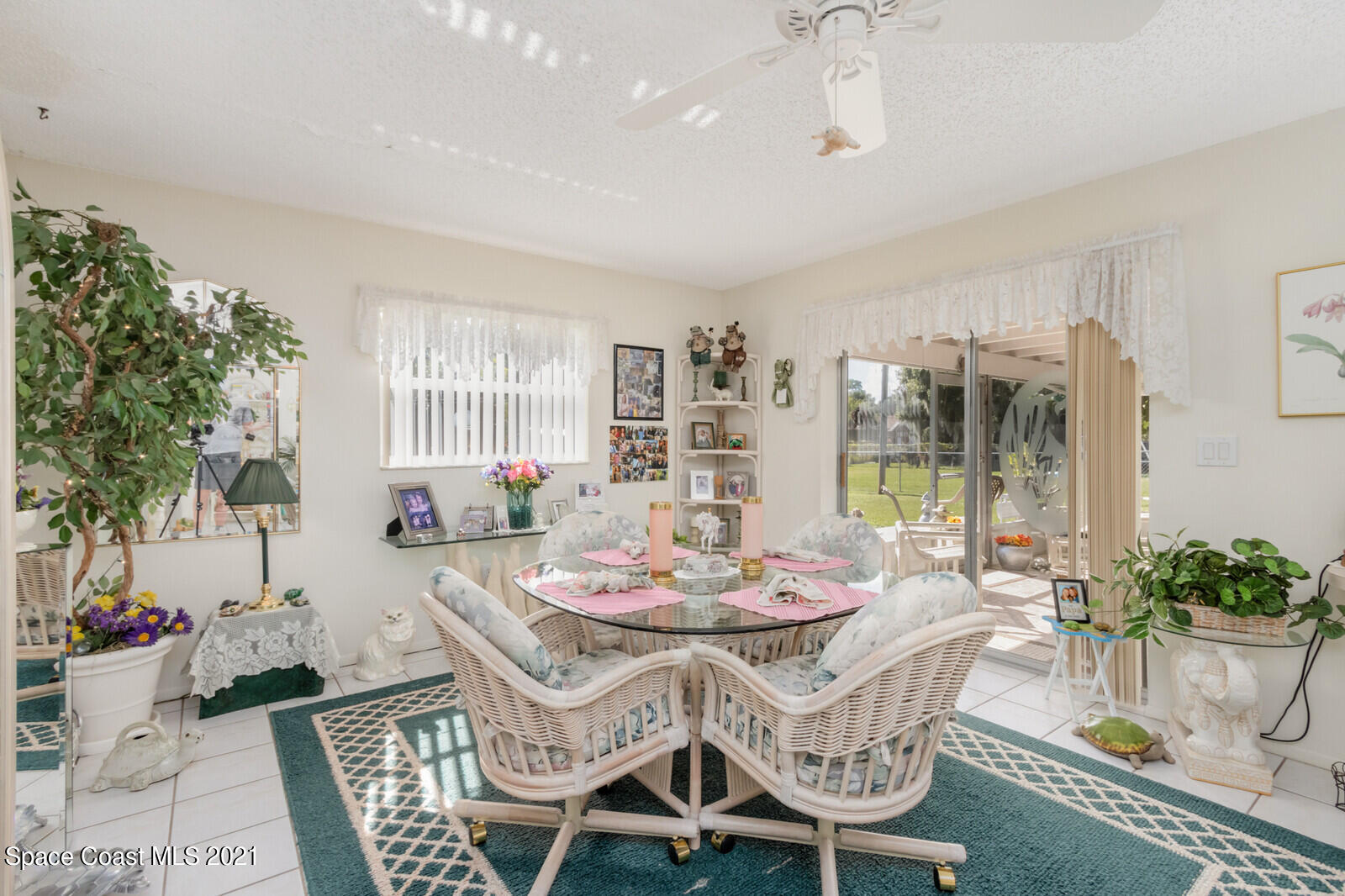 1953 Trimble Road Melbourne, FL 32934 - Photo 20 of 70 a view of a dining room with furniture window and outside view