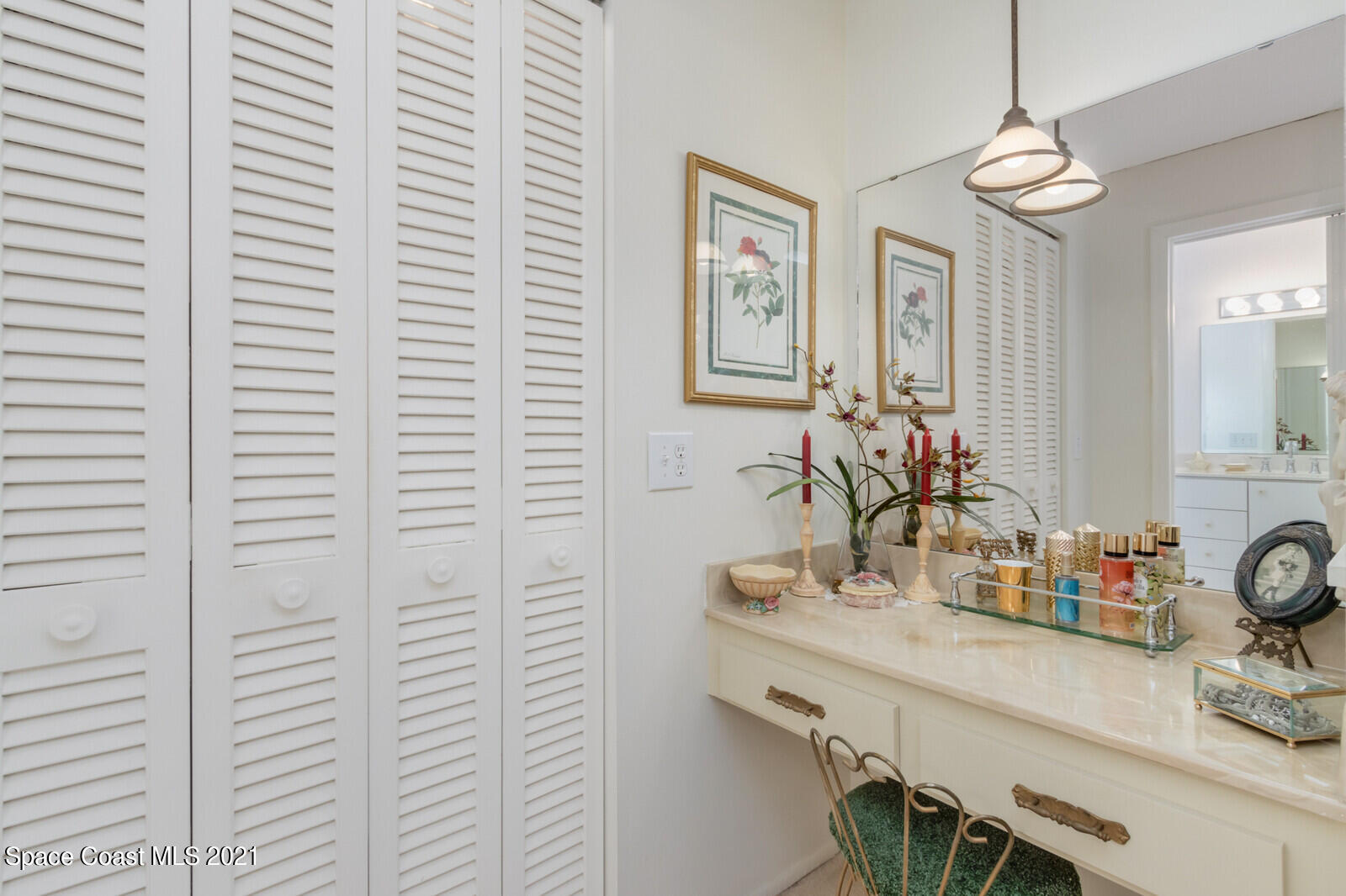 1953 Trimble Road Melbourne, FL 32934 - Photo 27 of 70 a bathroom with a sink and a mirror
