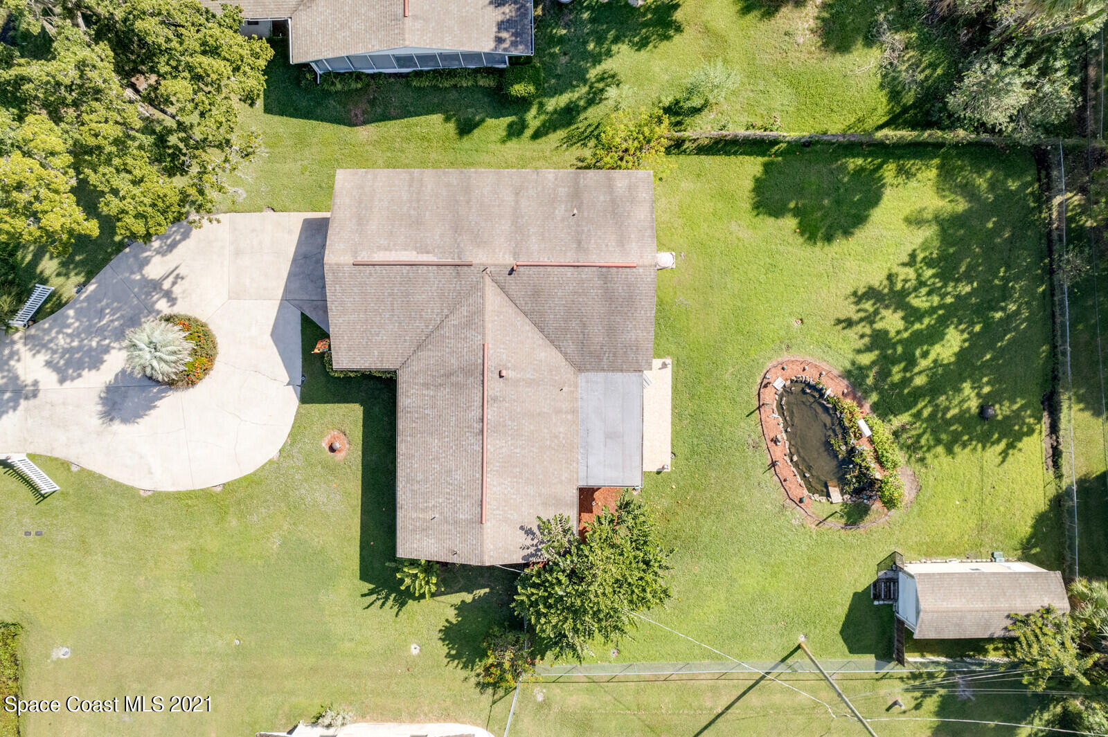 1953 Trimble Road Melbourne, FL 32934 - Photo 37 of 70 an aerial view of a house with a yard basket ball court