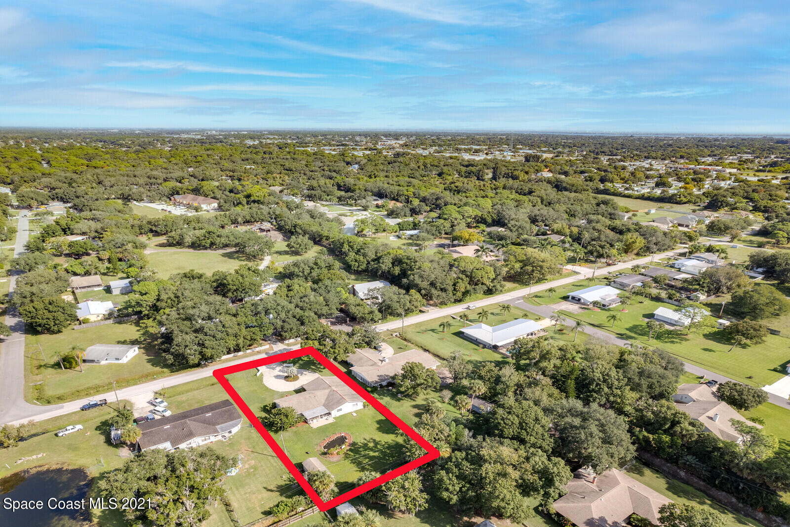 1953 Trimble Road Melbourne, FL 32934 - Photo 42 of 70 an aerial view of residential houses with outdoor space