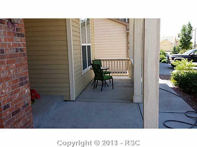 9373 St.George Road Peyton, CO 80831 - Photo 22 of 22 Front porch area.