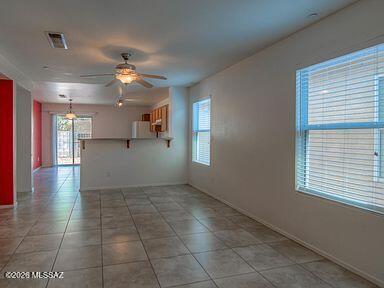 3248 West Treece Place Tucson, AZ 85742 - Photo 4 of 17 a view of a kitchen with a sink and a window