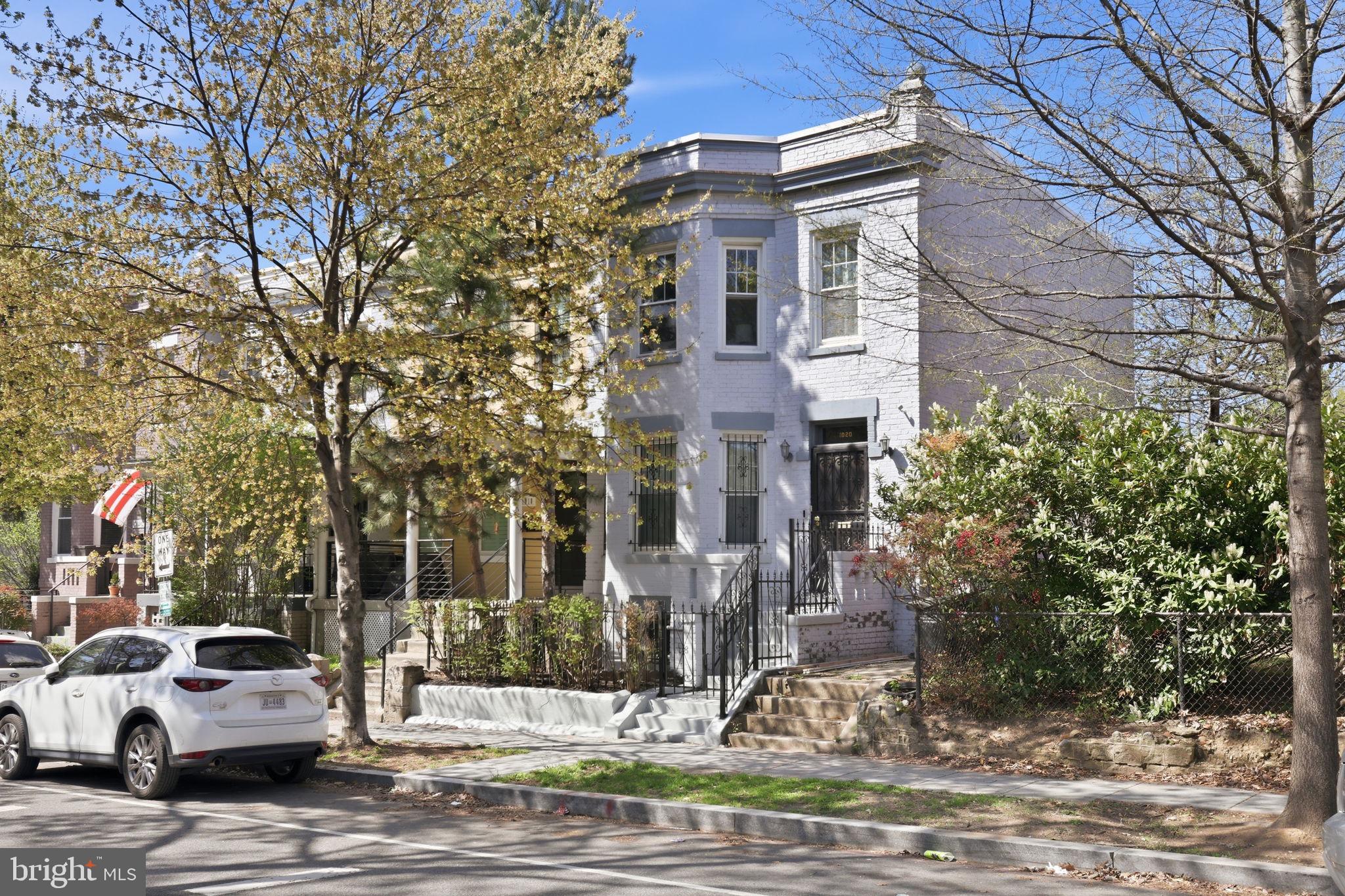 1020 10th Street Northeast Washington, DC 20002 - Photo 1 of 36 a view of a building with a yard