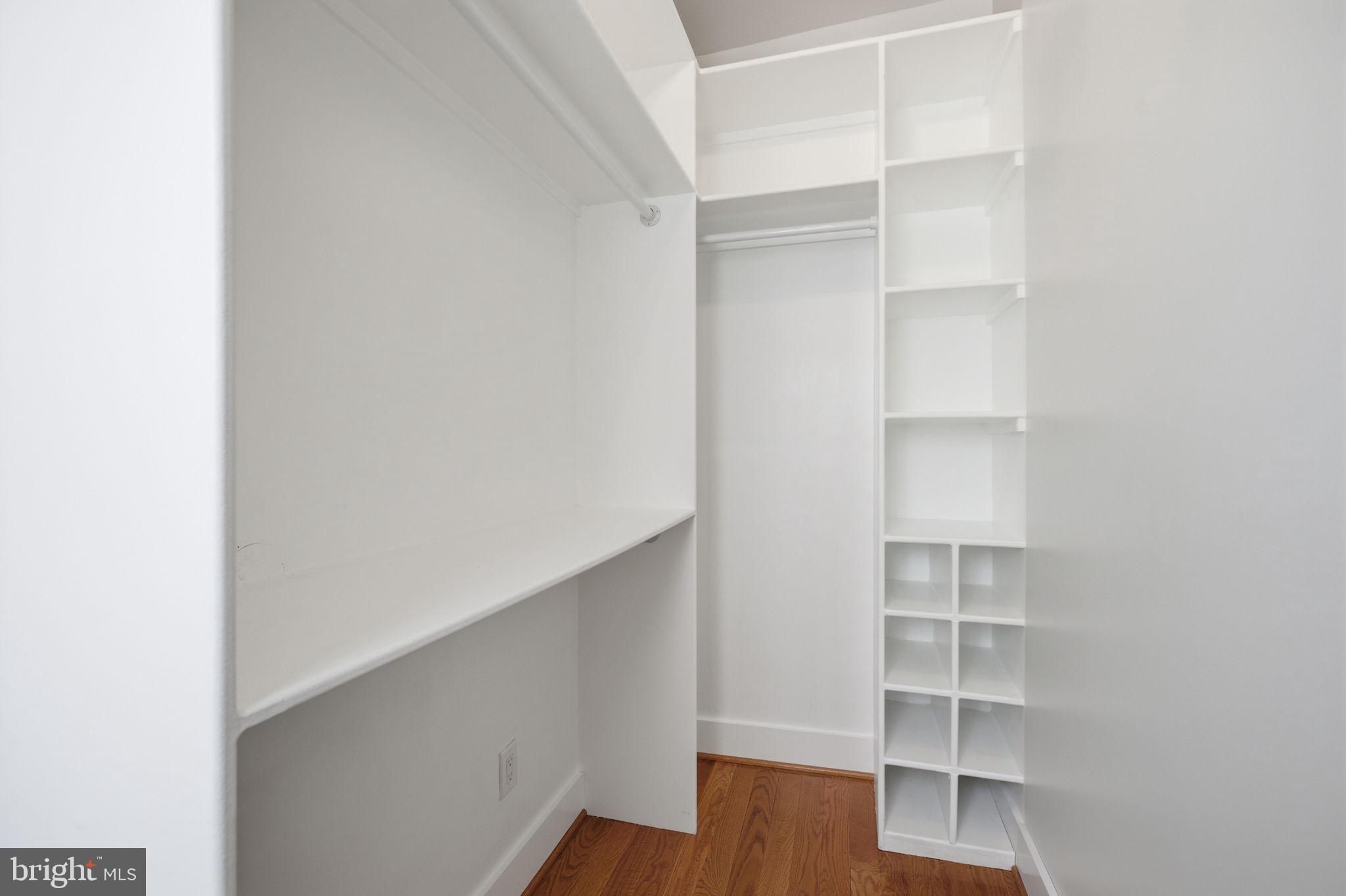 1020 10th Street Northeast Washington, DC 20002 - Photo 25 of 36 a view of walk in closet with empty racks