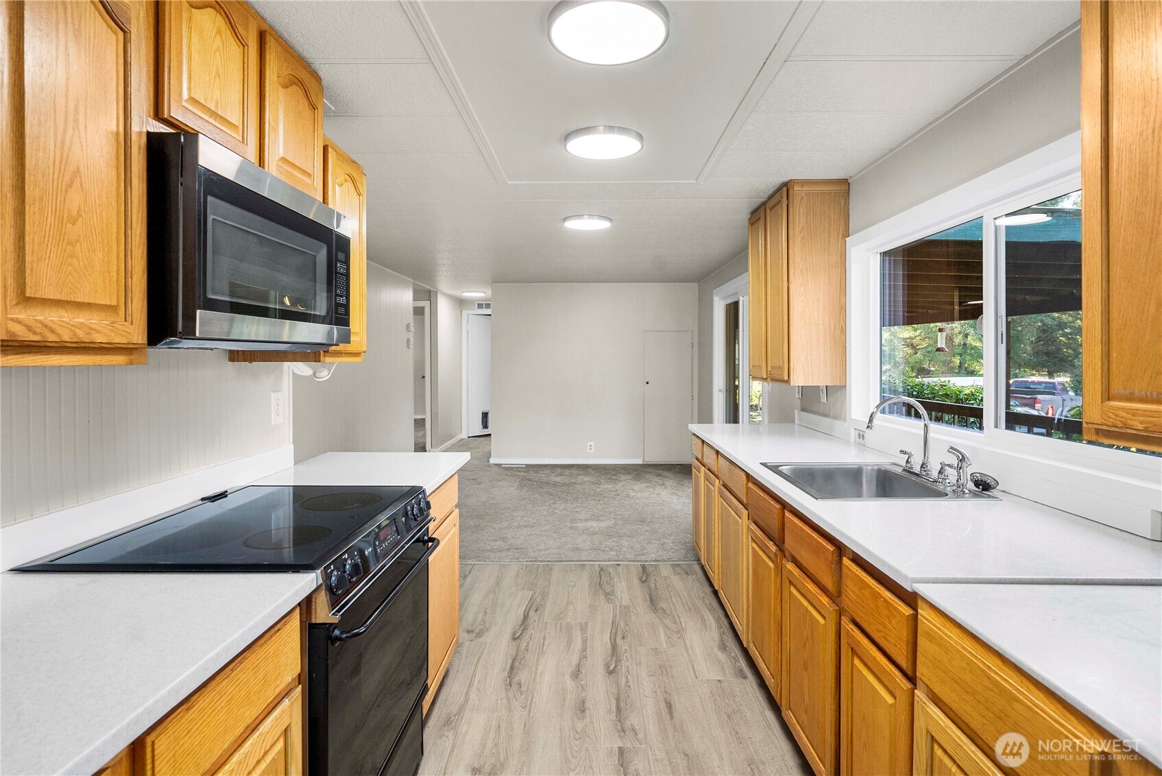 733 Tipsoo Loop South Rainier, WA 98576 - Photo 14 of 37 a kitchen with a sink and a stove top oven
