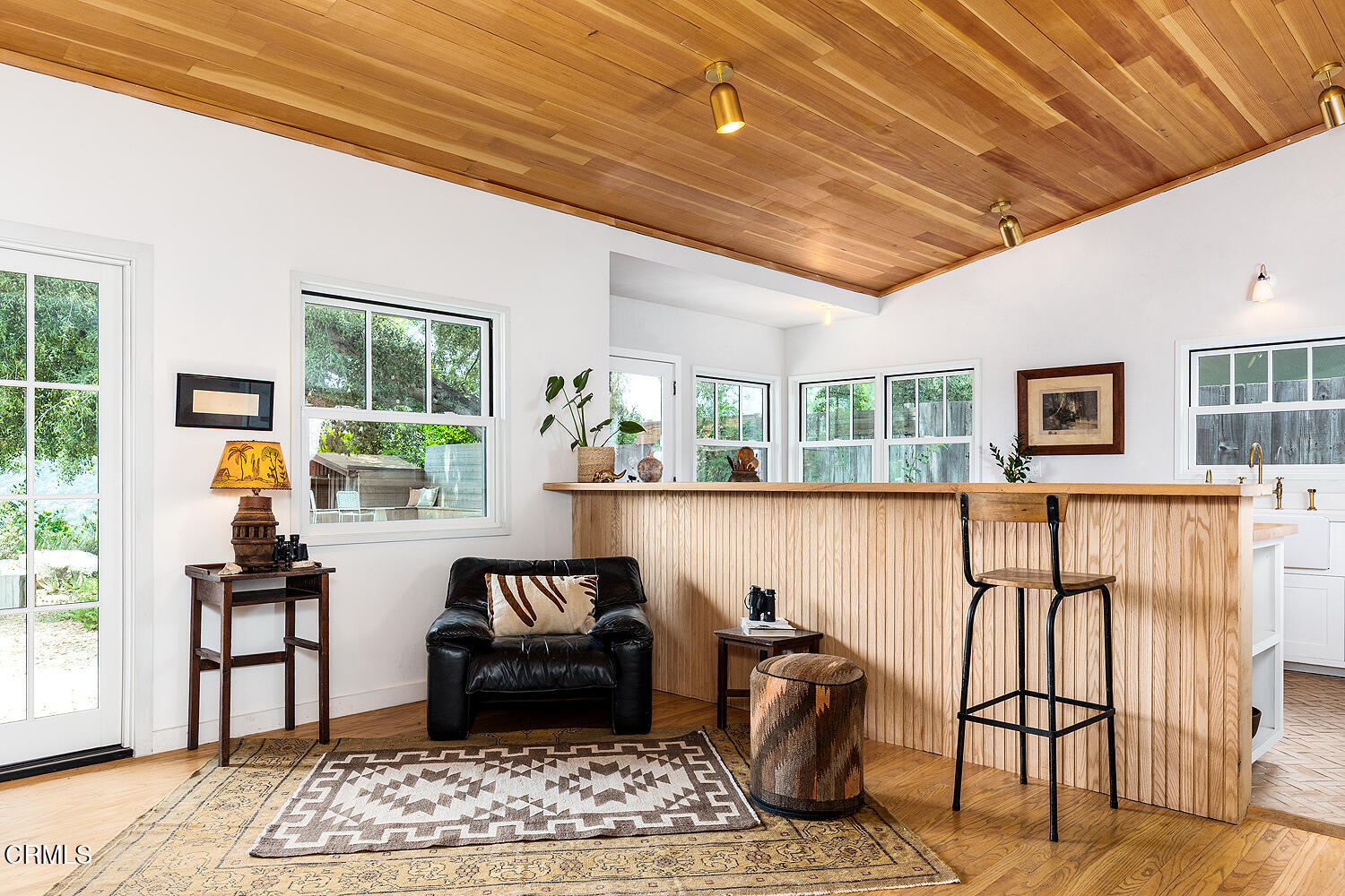 4155 Aralia Road Altadena, CA 91001 - Photo 14 of 40 a living room with furniture a window and a potted plant