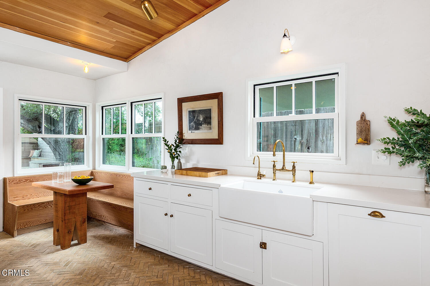 4155 Aralia Road Altadena, CA 91001 - Photo 16 of 40 a view of a sink and dishwasher with wooden floor