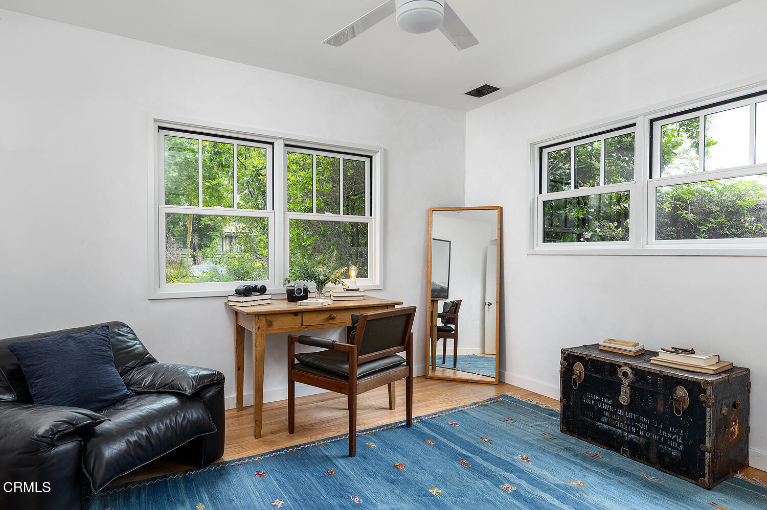 4155 Aralia Road Altadena, CA 91001 - Photo 20 of 40 a living room with furniture and a window