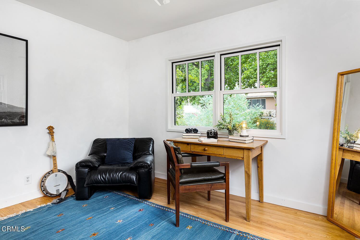 4155 Aralia Road Altadena, CA 91001 - Photo 21 of 40 a living room with furniture and a window