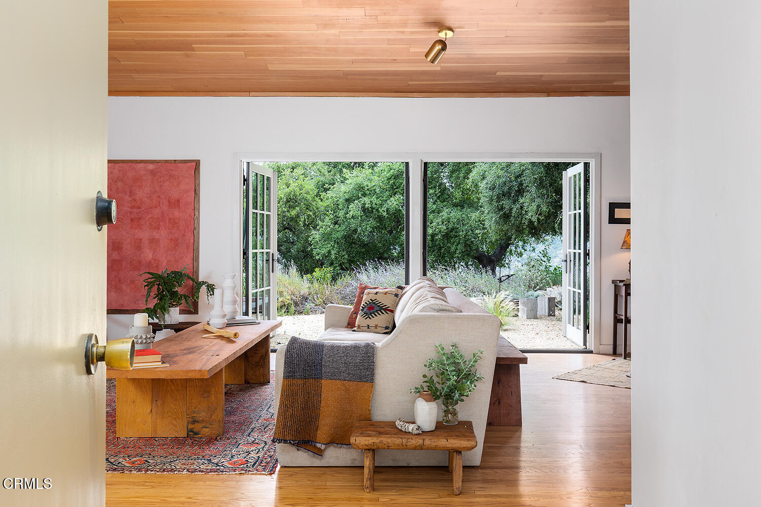 4155 Aralia Road Altadena, CA 91001 - Photo 7 of 40 a living room with patio furniture and a floor to ceiling window