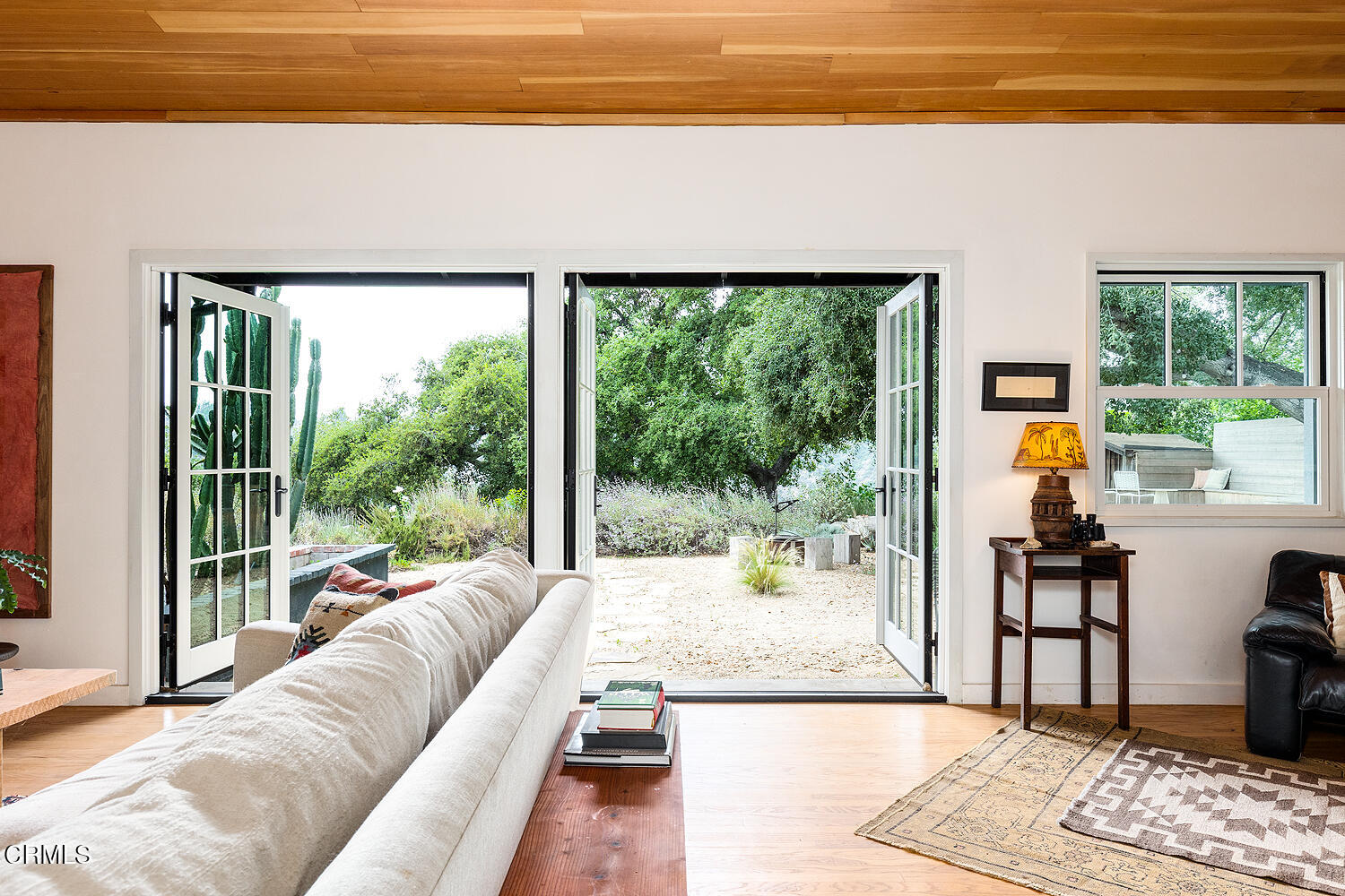 4155 Aralia Road Altadena, CA 91001 - Photo 8 of 40 a living room with furniture and a large window
