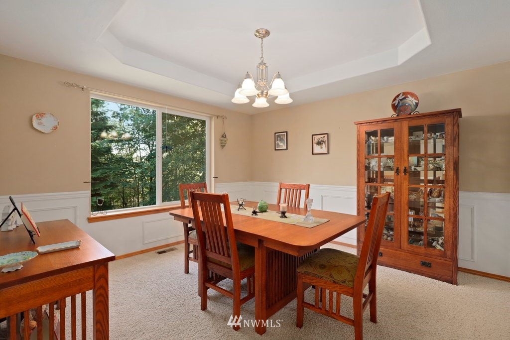 10606 Wagner Road Snohomish, WA 98290 - Photo 15 of 40 a view of a dining room with furniture window and outside view