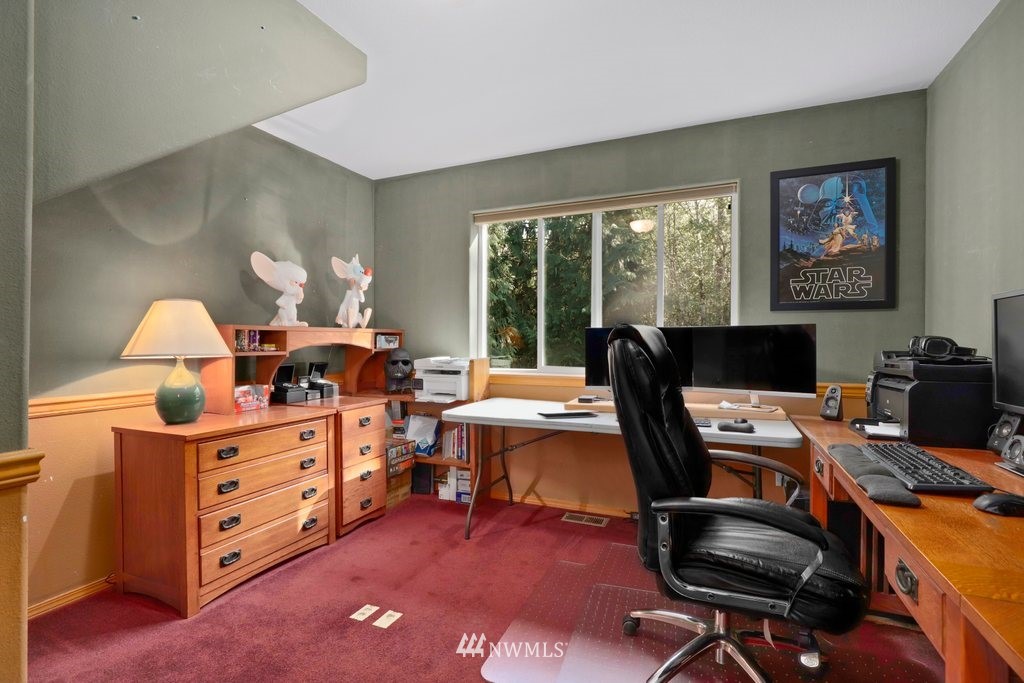 10606 Wagner Road Snohomish, WA 98290 - Photo 18 of 40 a view of a workspace with furniture and a window