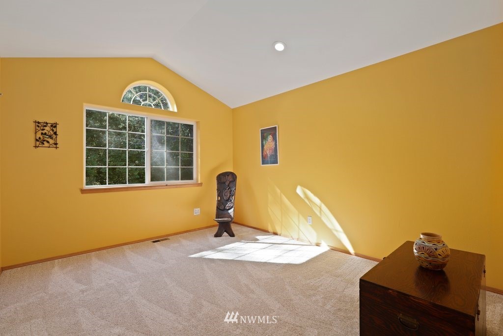 10606 Wagner Road Snohomish, WA 98290 - Photo 26 of 40 a view of a big room with windows