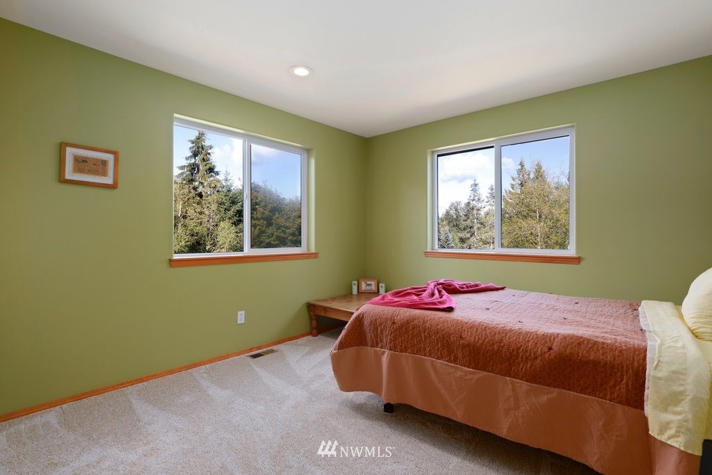 10606 Wagner Road Snohomish, WA 98290 - Photo 28 of 40 a bedroom with a bed and a window